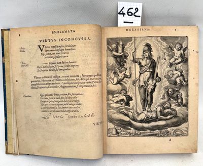 an old book with a picture of a man holding a sword