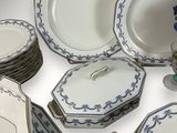 a lot of plates that are sitting on a table