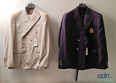 two jackets hanging on a wall next to each other