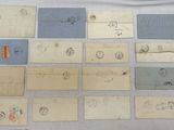 an image of a collection of old envelopes on a table