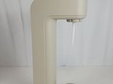 a white machine that is sitting on a table