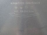 a close up of a metal cutting board with numbers on it