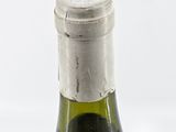a bottle of wine that is sitting on a table