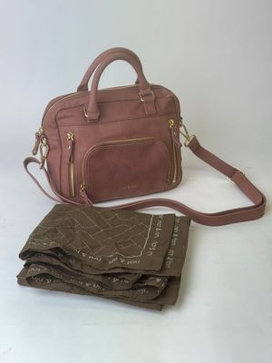 pink leather handbag with matching wallet and scarf