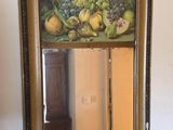 a picture of a painting hanging on the wall above a mirror