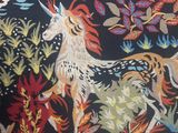 an image of a tapestry with horses and birds on it