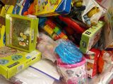 a pile of children ' s toys and toys on a table