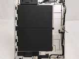 an image of a close up of a cell phone with a broken battery