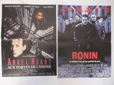 quelques affiches de cinéma accrochées au mur d'une pièce