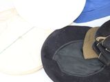 three hats that are sitting next to each other