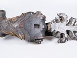 two pieces of wood that have been carved into the shape of a cross