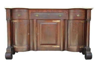 une photo d'une commode en bois avec un plateau en marbre et des tiroirs