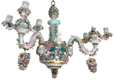 a chandelier that has a bunch of flowers on it
