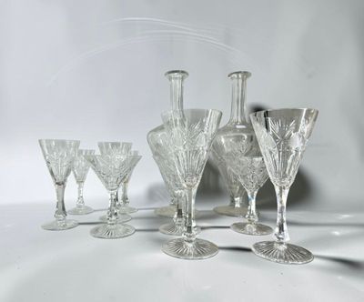 a lot of glass items that are sitting on a table