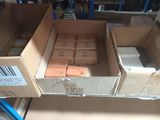 many boxes that are stacked on top of each other