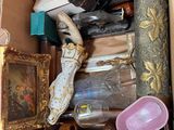 a cardboard box filled with assorted items and items