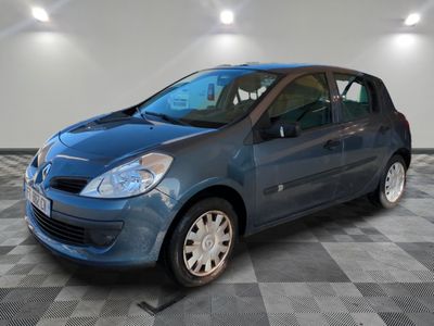 a picture of a blue car parked in a garage