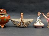 a group of figurines that are sitting on a table