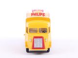 a small yellow bus with a sign on the front