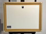 a picture of an easel with a white board on it