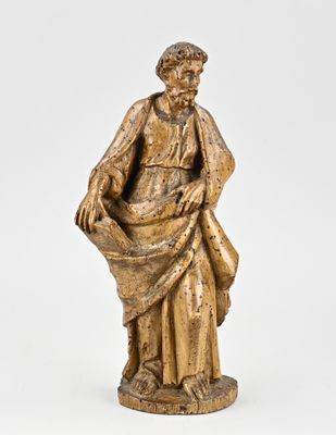 an image of a statue of a man holding a bag