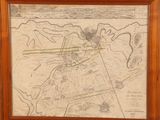 an old map of the city of boston in a wooden frame