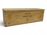an old wooden box with a label on it sitting on a white surface