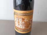 a bottle of wine that is sitting on a table