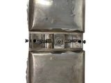 a silver metal case with a handle on a white background