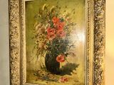 a painting of flowers in a vase on the wall