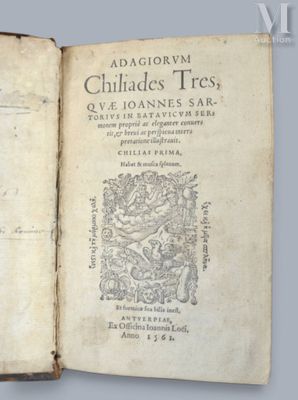 un livre ouvert sur lequel est dessiné un dragon