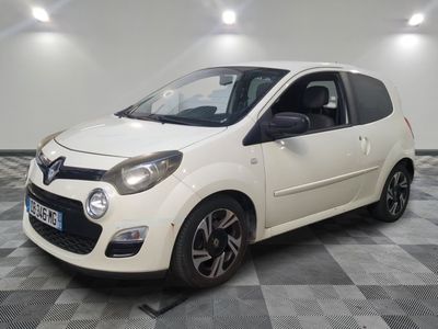 a picture of a white car parked in a garage
