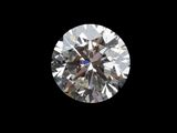 a close up of a diamond on a black background