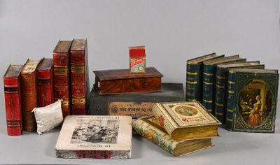 a lot of books that are sitting on a table