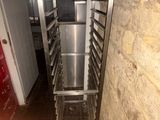 an image of a kitchen with a metal rack in it