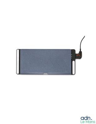 a close up of a cell phone with a cord attached to it