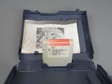 a blue box with a paper in it on a table