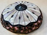 a decorative box with a pink and black design on it