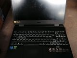 a laptop that is sitting on the floor in the room