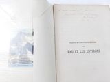 an open book with a picture of a man on it