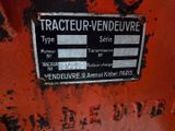 a sign on the side of a tractor that says tractoreur vend d ' hivevre