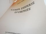 a close up of a book open on a table