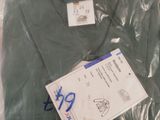 a pile of clothing that is sitting in a box