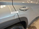 a sticker on the side of a car that has a sticker attached to it