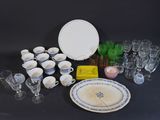 many different types of glassware on the table