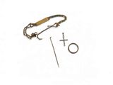 a close up of a pair of scissors and a hook on a white surface