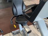 an image of a gym room with a tread machine and other equipment