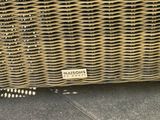 an image of a close up of a wicker basket on the ground