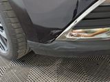 a close up of the front bumper of a car