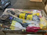 a cart full of items that are wrapped in plastic
